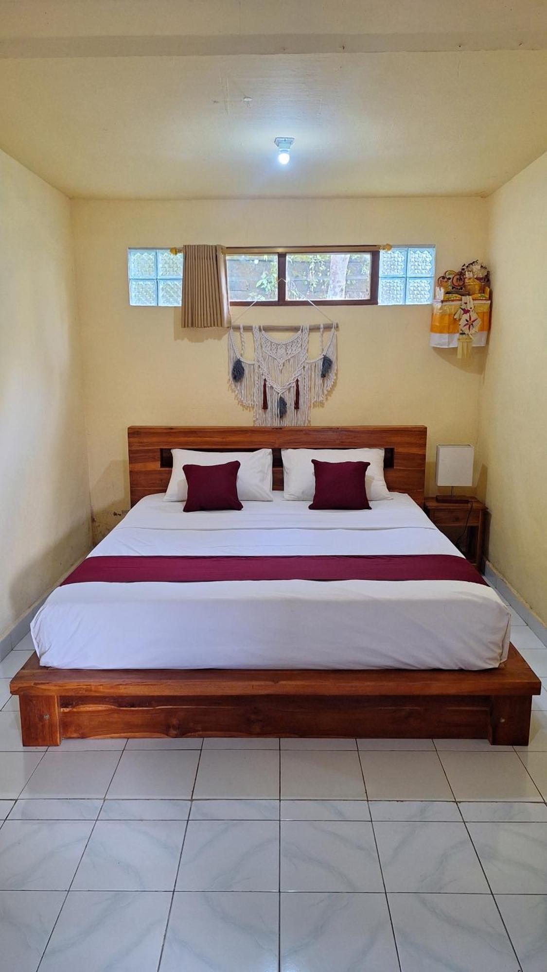 Rindu Homestay Undisan Rum bild